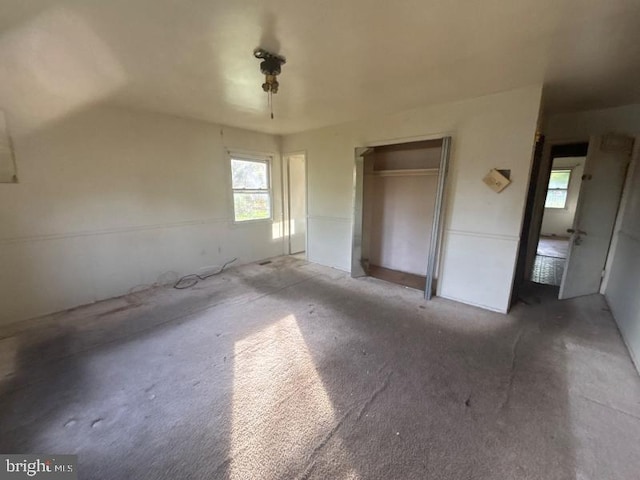 22 Trebing Ct, Willingboro, NJ 08046 - unfurnished bedroom with carpet, a closet, and multiple windows
