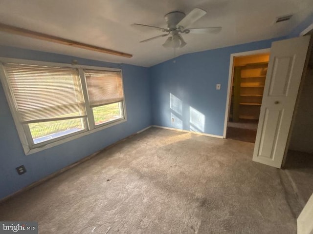 22 Trebing Ct, Willingboro, NJ 08046 - unfurnished bedroom with vaulted ceiling, a closet, a spacious closet, carpet floors, and baseboards
