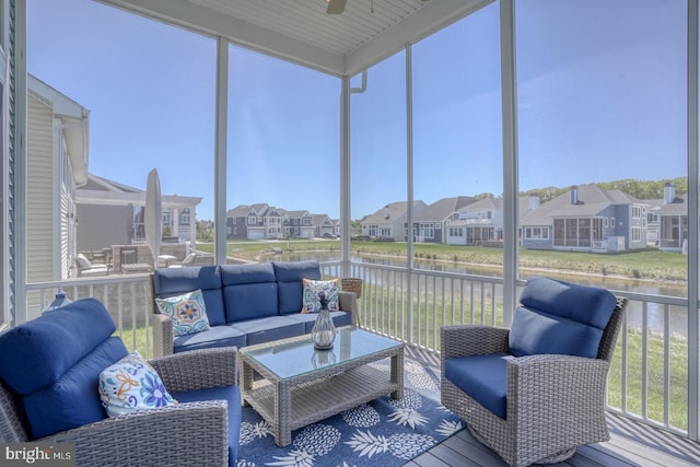 11520 Maull Rd Unit S-183, Lewes, DE 19958 - sunroom featuring a water view, ceiling fan, outdoor lounge area, and a residential view