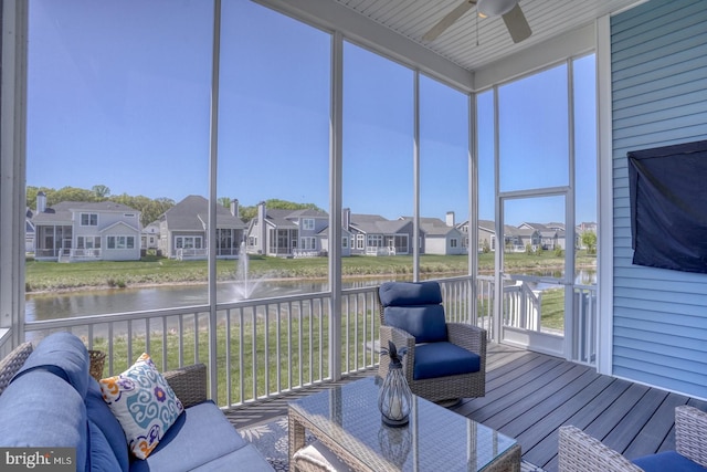 11520 Maull Rd Unit S-183, Lewes, DE 19958 - sunroom / solarium with plenty of natural light, a water view, ceiling fan, and a residential view