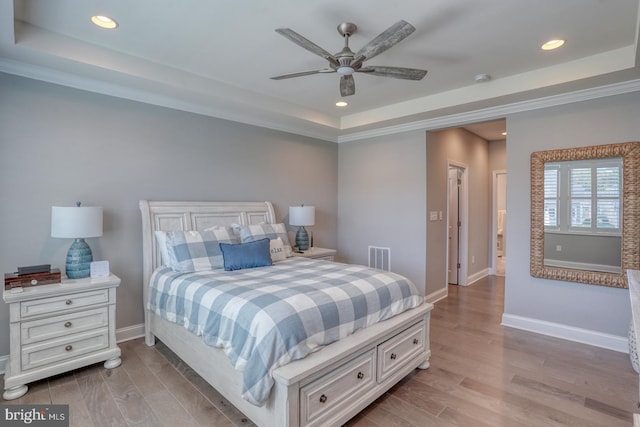 11520 Maull Rd Unit S-183, Lewes, DE 19958 - bedroom featuring recessed lighting, light wood-style flooring, and a tray ceiling
