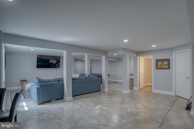 11520 Maull Rd Unit S-183, Lewes, DE 19958 - living room with finished concrete flooring, baseboards, and recessed lighting