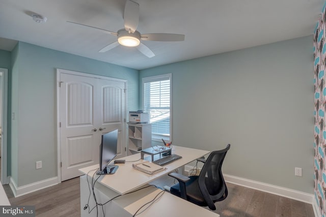 11520 Maull Rd Unit S-183, Lewes, DE 19958 - office area with baseboards, ceiling fan, and wood finished floors