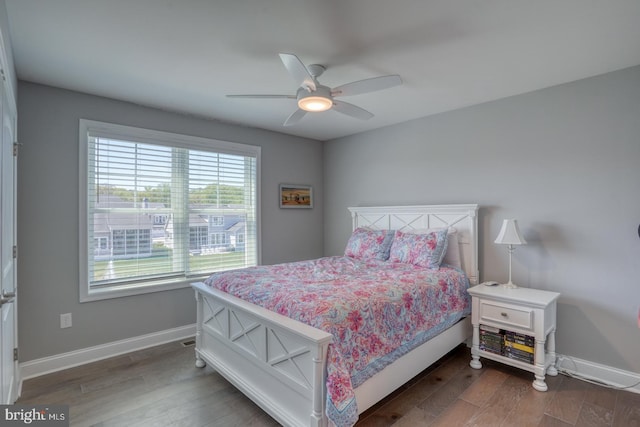 11520 Maull Rd Unit S-183, Lewes, DE 19958 - bedroom featuring baseboards, a ceiling fan, and wood finished floors