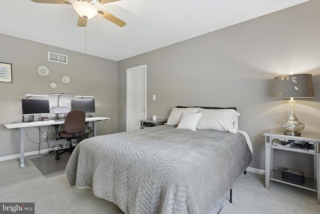 bedroom with visible vents, baseboards, a ceiling fan, and carpet floors