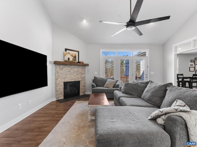 3185 Polecat Creek Ln, Scottsville, VA 24590 - living room with baseboards, high vaulted ceiling, wood finished floors, ceiling fan, and a fireplace