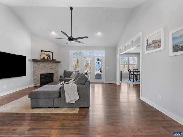 3185 Polecat Creek Ln, Scottsville, VA 24590 - living room featuring a ceiling fan, wood finished floors, high vaulted ceiling, and a stone fireplace