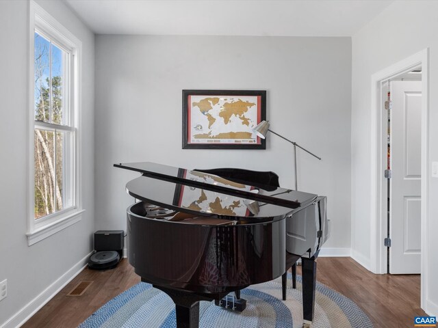 3185 Polecat Creek Ln, Scottsville, VA 24590 - office area featuring visible vents, baseboards, and wood finished floors