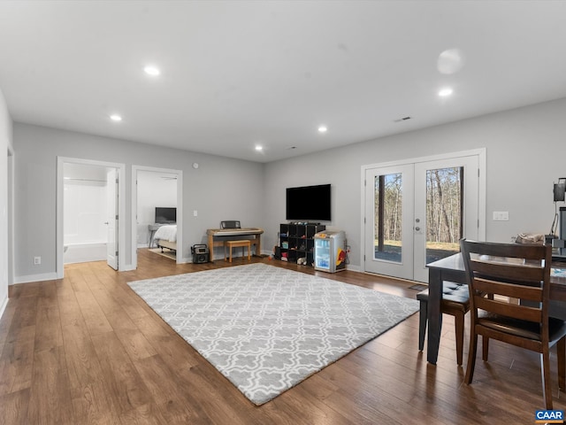 3185 Polecat Creek Ln, Scottsville, VA 24590 - living area with baseboards, french doors, wood finished floors, and recessed lighting