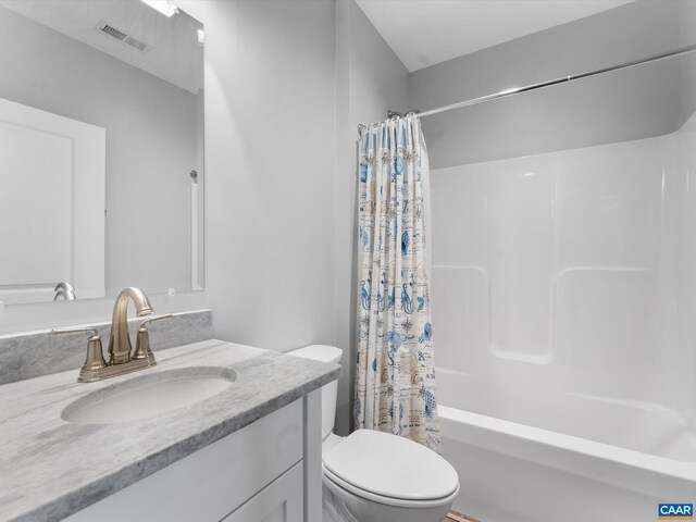 3185 Polecat Creek Ln, Scottsville, VA 24590 - bathroom featuring vanity, visible vents, shower / bathtub combination with curtain, and toilet
