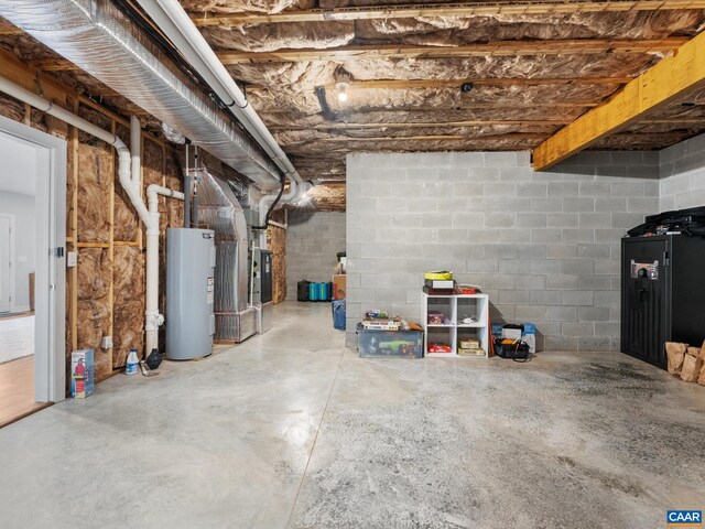 3185 Polecat Creek Ln, Scottsville, VA 24590 - unfinished basement with concrete block wall and electric water heater