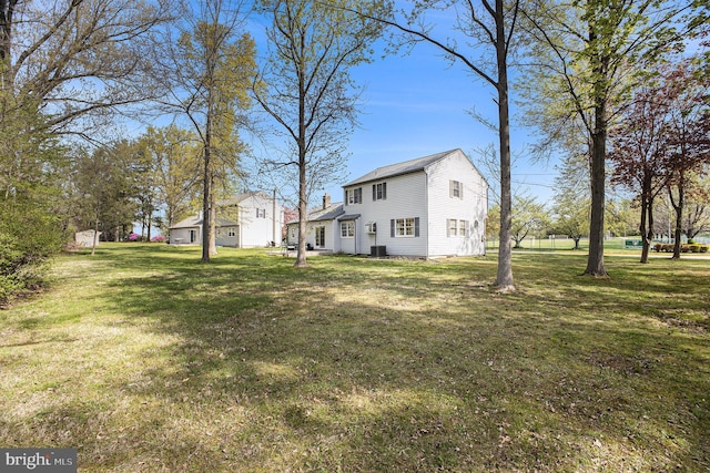 view of yard featuring central AC