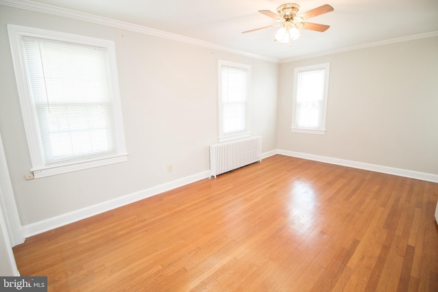 23075 Hollywood Rd, Leonardtown, MD 20650 - empty room with ceiling fan, baseboards, radiator heating unit, and light wood finished floors