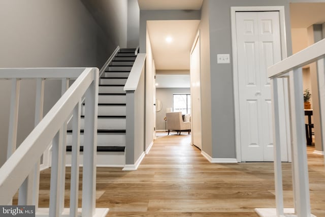 7374 Hickory Log Cir, Columbia, MD 21045 - stairs with wood finished floors and baseboards