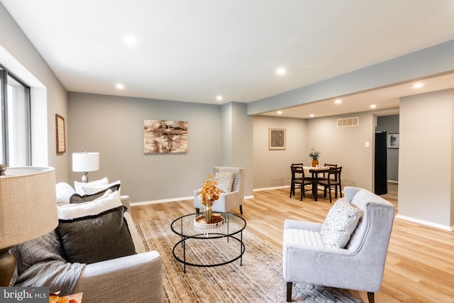 7374 Hickory Log Cir, Columbia, MD 21045 - living room with recessed lighting, light wood-type flooring, and baseboards
