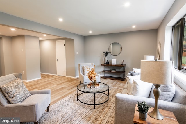 7374 Hickory Log Cir, Columbia, MD 21045 - living room with recessed lighting, light wood-style flooring, and baseboards