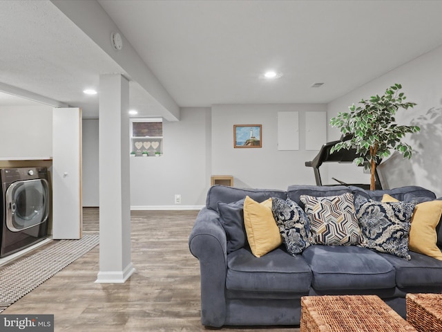 6558 Gildar St, Alexandria, VA 22310 - living room featuring washer / dryer, wood finished floors, baseboards, and recessed lighting