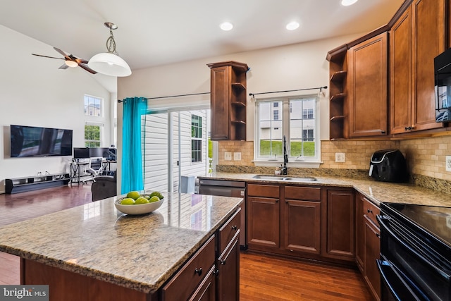 17365 Tedler Cir, Round Hill, VA 20141 - kitchen featuring open shelves, light stone counters, a sink, tasteful backsplash, and dark wood finished floors