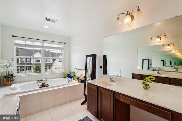 17365 Tedler Cir, Round Hill, VA 20141 - bathroom with tile patterned flooring, a bath, and vanity