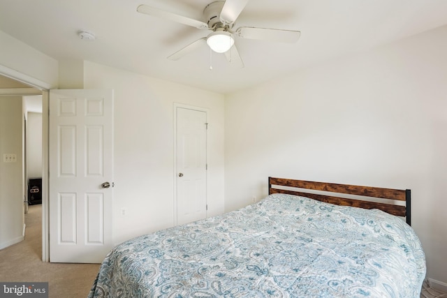 17365 Tedler Cir, Round Hill, VA 20141 - bedroom with light colored carpet, ceiling fan, and baseboards