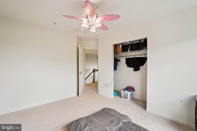 17365 Tedler Cir, Round Hill, VA 20141 - unfurnished bedroom with carpet, a closet, baseboards, and ceiling fan