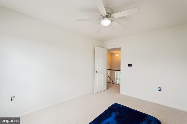 17365 Tedler Cir, Round Hill, VA 20141 - unfurnished bedroom featuring light carpet, baseboards, and ceiling fan
