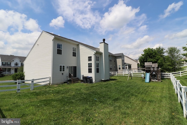 17365 Tedler Cir, Round Hill, VA 20141 - back of property featuring entry steps, a playground, and a chimney