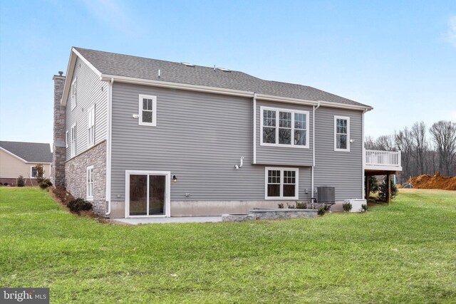 204 Baldy Ln Cayot, Unit Cayot, Middletown, DE 19709 - rear view of house with a lawn, cooling unit, and a chimney