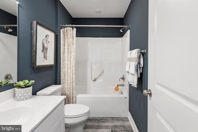 204 Baldy Ln Cayot, Unit Cayot, Middletown, DE 19709 - full bathroom with toilet, shower / bath combo with shower curtain, vanity, and wood finished floors