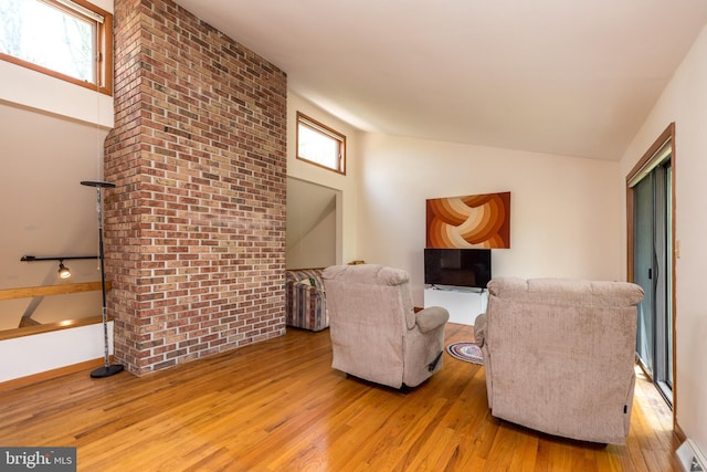 living area with light wood-style floors