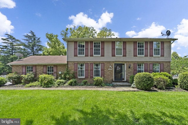 12916 New Hampshire Ave, Silver Spring, MD 20904 - view of front of house with a front lawn and brick siding