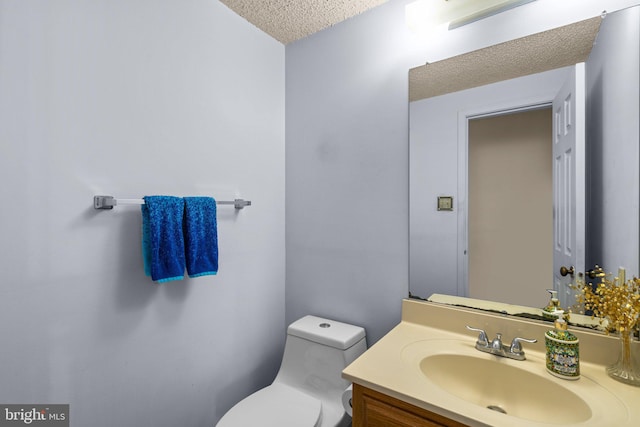 12916 New Hampshire Ave, Silver Spring, MD 20904 - bathroom with a textured ceiling and vanity