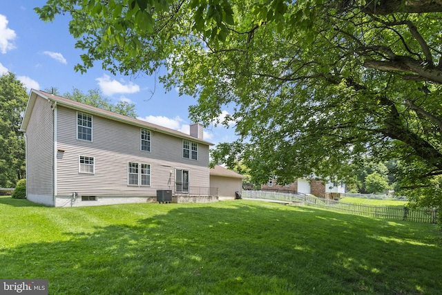 12916 New Hampshire Ave, Silver Spring, MD 20904 - back of house with a chimney