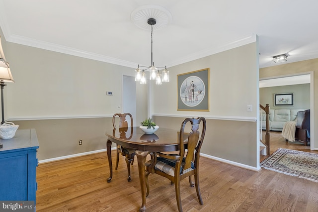 15427 Martins Hundred Dr, Centreville, VA 20120 - dining area with baseboards, wood finished floors, and crown molding