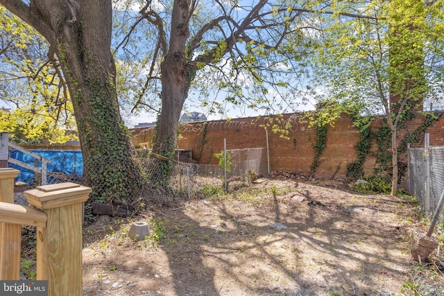 view of yard featuring fence