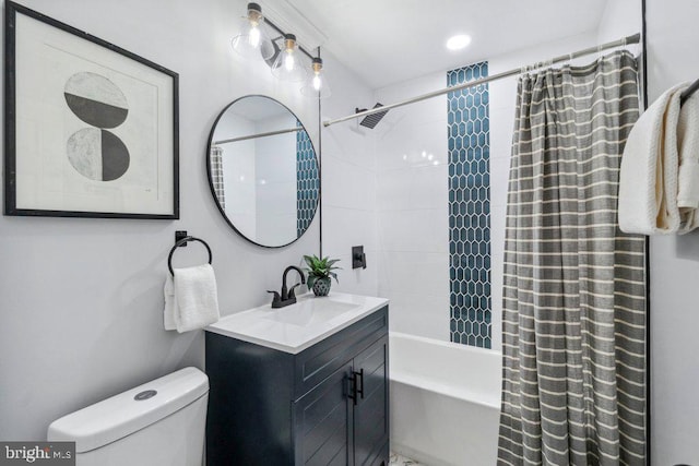 bathroom featuring vanity, shower / bath combo, and toilet