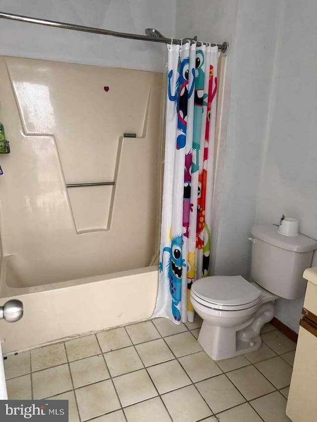 3301 Windermere Dr, Bushkill, PA 18324 - bathroom featuring shower / bath combination with curtain, tile patterned flooring, vanity, and toilet