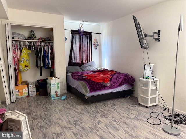 3301 Windermere Dr, Bushkill, PA 18324 - bedroom featuring wood finished floors, a closet, and visible vents