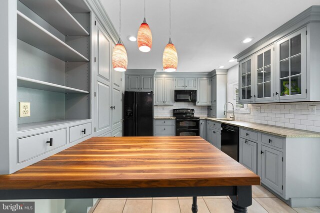 413 Bucktoe Rd, Avondale, PA 19311 - kitchen featuring black appliances, gray cabinets, a sink, glass insert cabinets, and recessed lighting