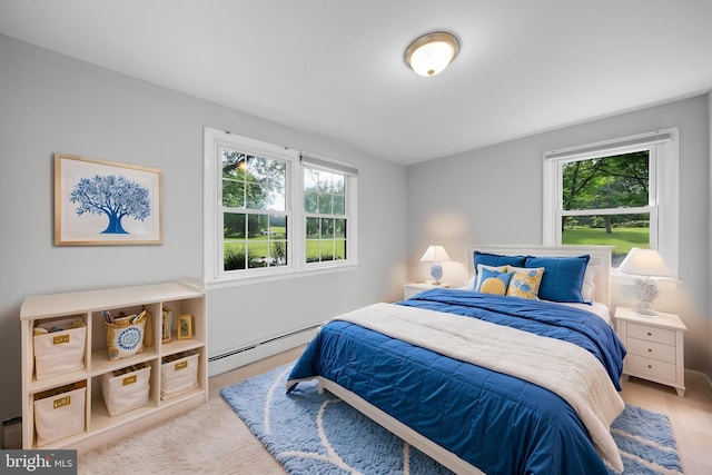 413 Bucktoe Rd, Avondale, PA 19311 - bedroom featuring baseboard heating, multiple windows, and a baseboard radiator