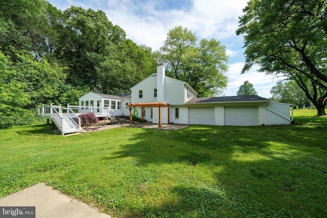413 Bucktoe Rd, Avondale, PA 19311 - rear view of house with a pergola, a yard, a chimney, and a deck