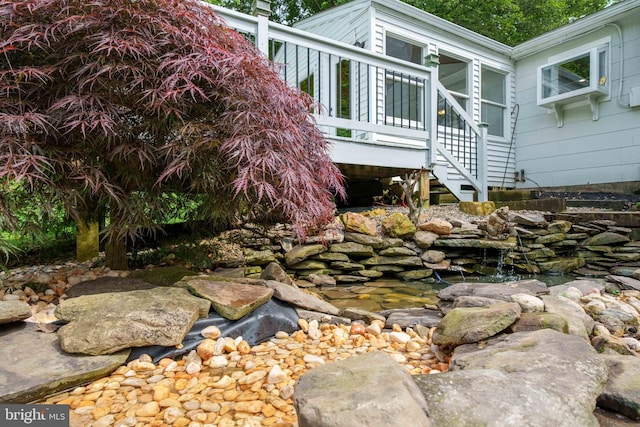 413 Bucktoe Rd, Avondale, PA 19311 - view of home's exterior with a deck and stairway