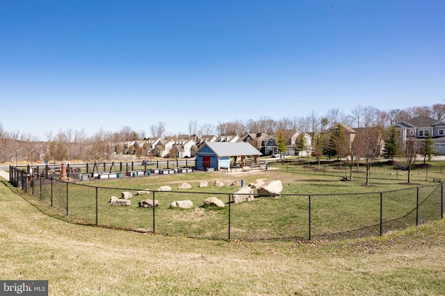 view of community featuring a dog friendly area and a residential view