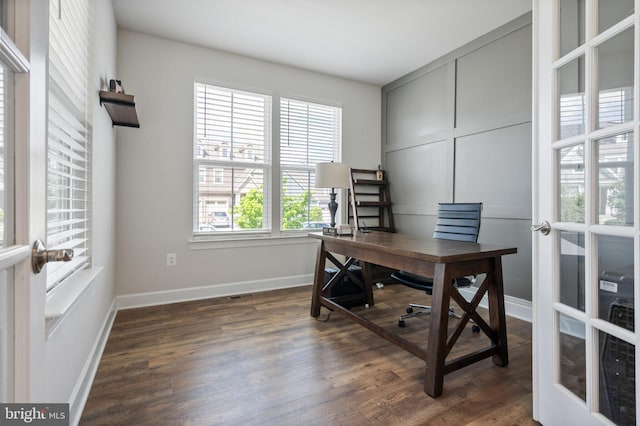 office featuring baseboards and dark wood-style flooring