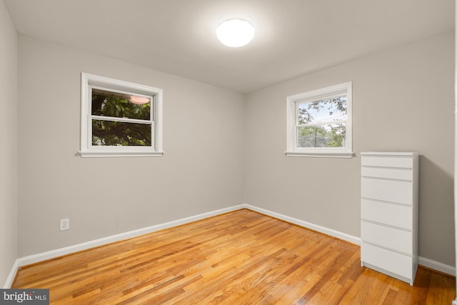 909 Snure Rd, Silver Spring, MD 20901 - unfurnished bedroom with light wood-type flooring and baseboards