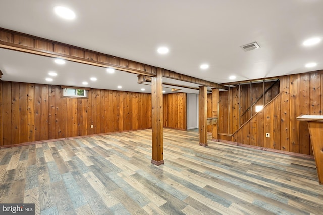 909 Snure Rd, Silver Spring, MD 20901 - below grade area with wood walls and wood finished floors