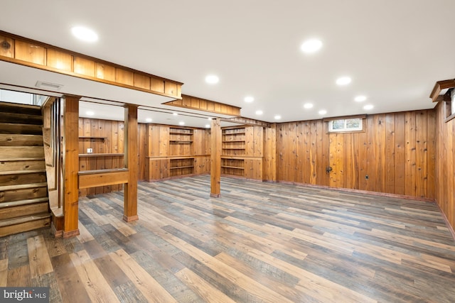 909 Snure Rd, Silver Spring, MD 20901 - below grade area featuring stairway, wood walls, wood finished floors, and recessed lighting