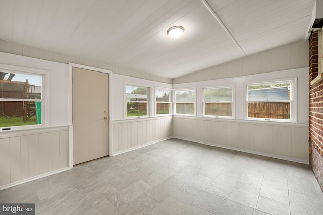 909 Snure Rd, Silver Spring, MD 20901 - unfurnished sunroom featuring healthy amount of natural light, wooden walls, lofted ceiling, and baseboards