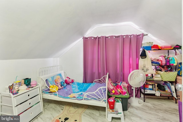 bedroom featuring vaulted ceiling