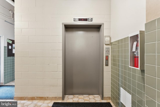 doorway to property with elevator